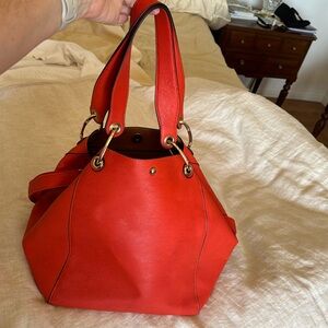 Brand new. Never carried. Melie Bianco Vegan leather shoulder bag with strap.